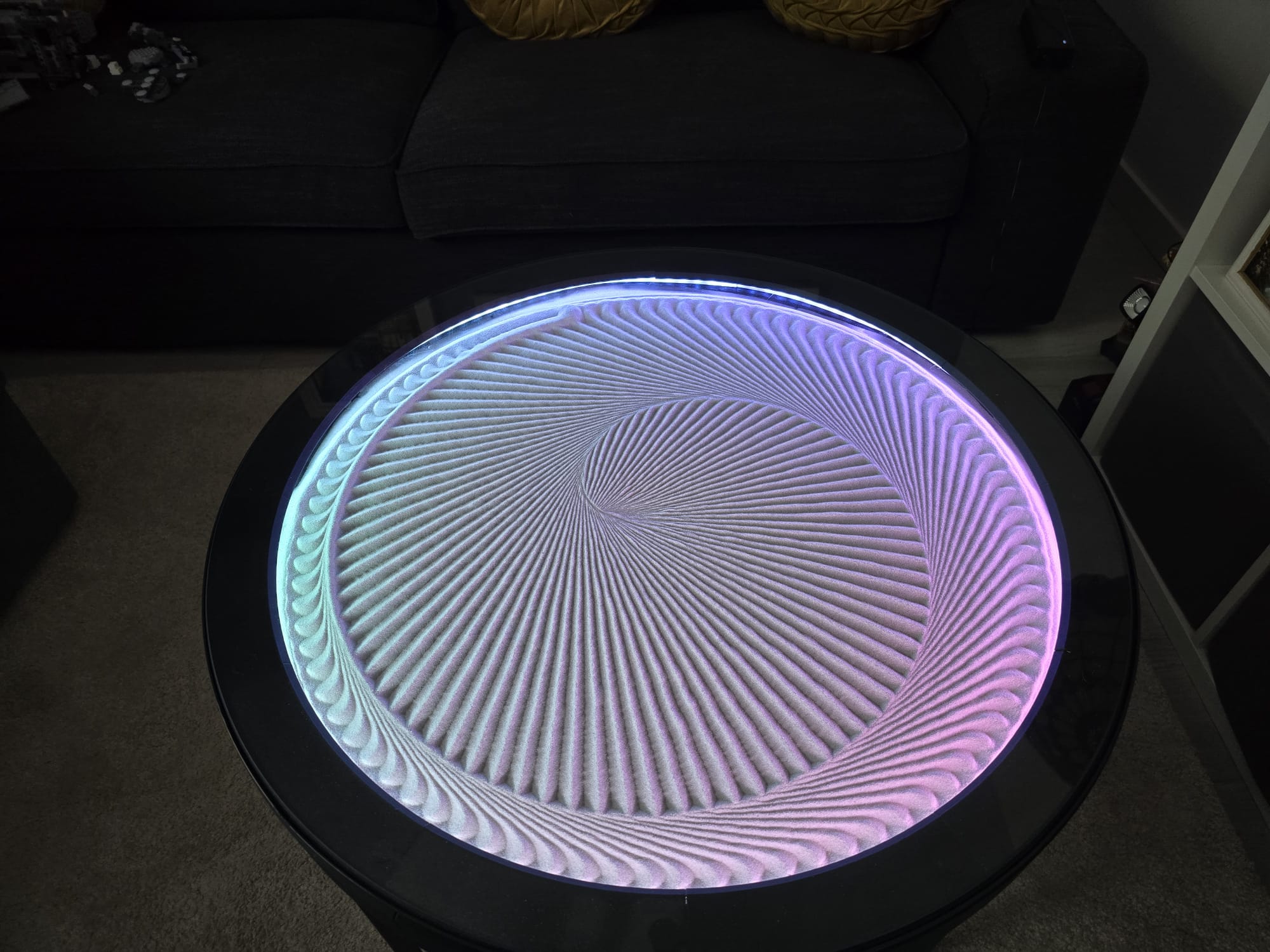 Spirală în nisip cu iluminare pastel